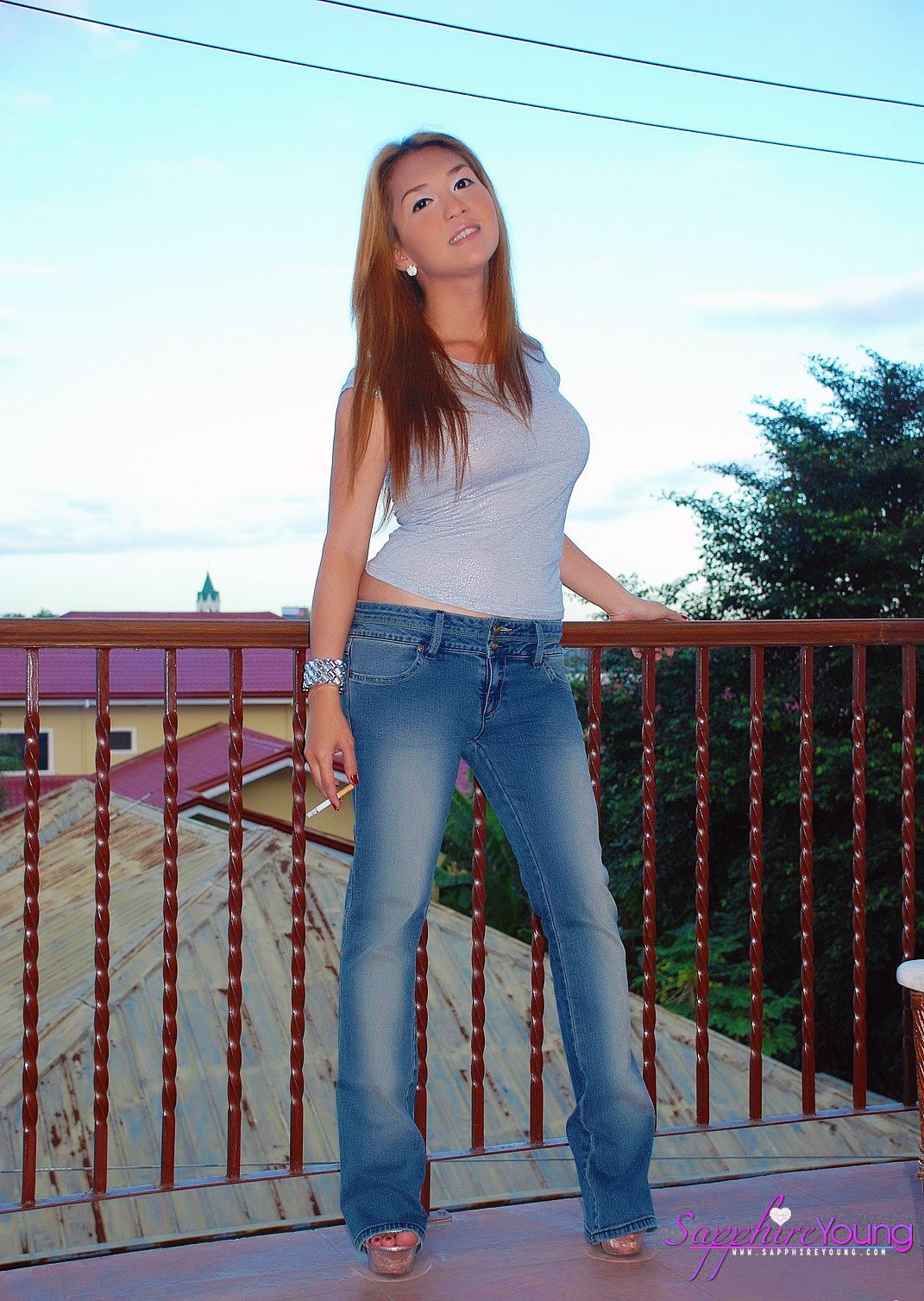 Sapphire Young Strips off her jeans. 